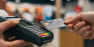 Credit card being used for daily spending to earn cash back and savings