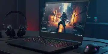 Gaming laptop with vibrant RGB keyboard and screen displaying a game, accompanied by a mouse and headset on a modern desk.